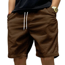 Side angle view of Cordero FiveCent Flex Cord Shorts in brown.