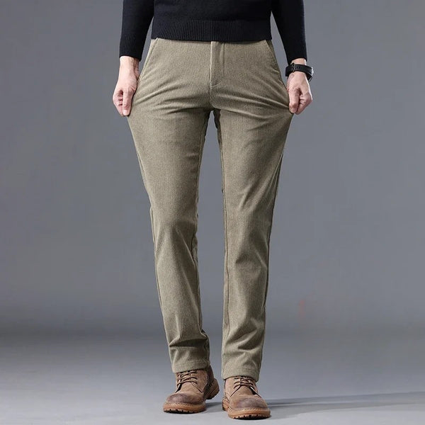 Front view of men's corduroy mid-rise thermal trousers in khaki, showcasing modern straight-leg fit and classic corduroy texture.
