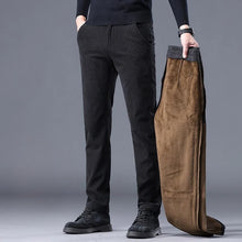 Front view of men's corduroy mid-rise thermal trousers in black, showcasing modern straight-leg fit and classic corduroy texture.