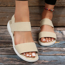 Model wearing cream Rubber Open Toe Low Heel Sandals