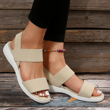 Model wearing cream Rubber Open Toe Low Heel Sandals