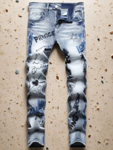 Men’s crownamore inkthread graffiti embroidered denim jeans front view light blue