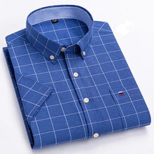 Folded front view of men’s dark blue Prestige Stripe Plaid Oxford short sleeve button-down shirt