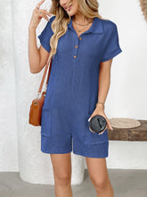 Side profile of woman in dark blue romper showing collar and sleeves.