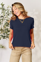 Model wearing Full Size Round Neck Short Sleeve T-Shirt in soft dark blue