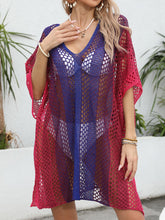 Model wearing dark blue Coastal Spectrum openwork contrast V-neck beach cover-up at poolside