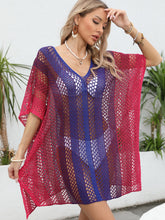 Model styled in red-violet Coastal Spectrum openwork contrast V-neck cover-up with beach sandals and accessories poolside