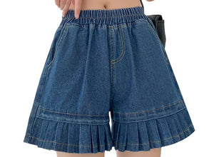 Plus size dark blue wide leg  jean shorts with spliced ruffle hem – front view.