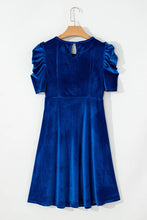 Back hanger view of Seylurette Velvet Dress in dark blue highlighting button neck closure and smooth velvet finish.