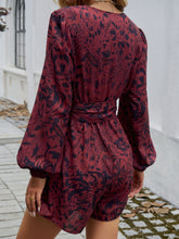 Back view of Floravelle™ Tied Romper with balloon sleeves in dark brown.