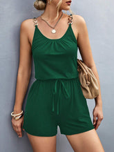 Sunkiss Move Romper in dark green styled with ankle boots and a denim jacket, perfect for a day-to-night transition.