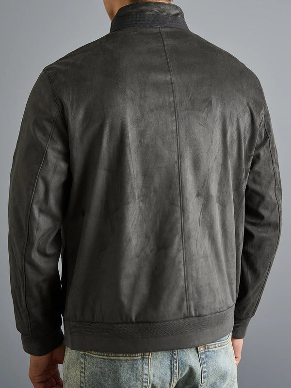 Dark Grey Men’s Luxe Suede Stand Collar Jacket with ribbed sleeves and chest zip pocket, back model pose.