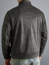 Dark Grey Men’s Luxe Suede Stand Collar Jacket with ribbed sleeves and chest zip pocket, back model pose.