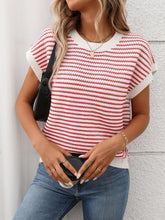 Model wearing Striped Round Neck Knit Top in deep red, paired with denim jeans for a chic casual daytime look.