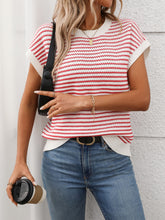 Model wearing Striped Round Neck Knit Top in Deep Red, paired with denim jeans for a chic casual daytime look.