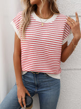 Model wearing Striped Round Neck Knit Top in deep red, paired with denim jeans for a chic casual daytime look.