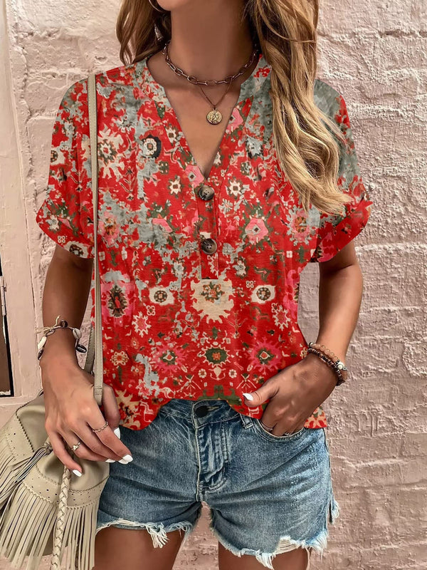 Model wearing Printed Notched Short Sleeve Blouse in deep red with relaxed fit