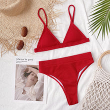 Front flat lay of deep red spaghetti strap ribbed bikini set displayed on hanger with adjustable straps