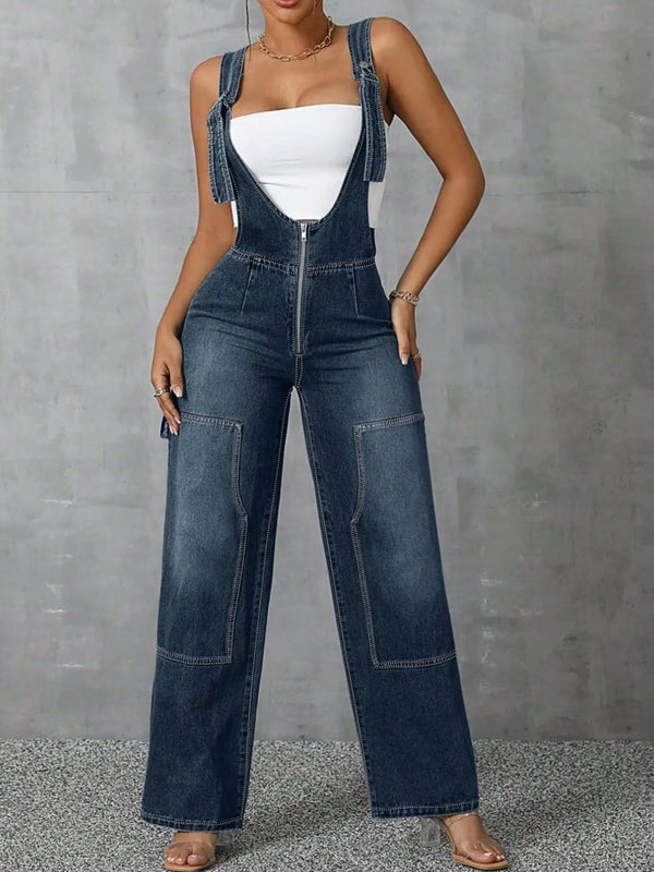 Model styled in Denivelle™ Medium Blue Overalls with crop top and heels.