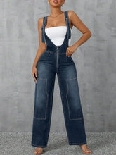 Front view of Denivelle™ Zip-Front Denim Overalls in medium blue wash.