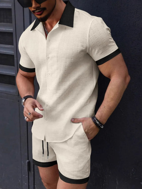 Front view of men's tan dual-trim shirt and shorts set styled with sunglasses and accessories.