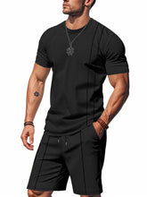 Man wearing black ModFlex set with vertical stripe, front view standing.