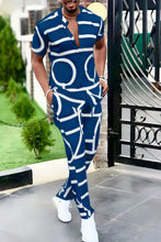 Men's dusty blue Drevion GeoSet Luxe short sleeve top and pants set front view on model.