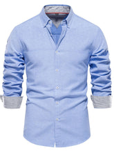 Front view of men’s dusty blue Apex Flourish quarter-sleeve button-down shirt