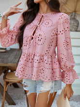 Laid-back lunch date look with model in PeplumMuse™ Blouse in Dusty Pink, distressed jean shorts, brown straw tote bag, pearl hoop earrings, and tan slip-on sandals.