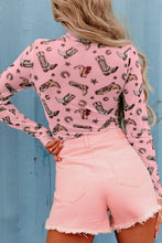 Back view of model showcasing a dusty pink Printed Mock Neck Long Sleeve Bodysuit with modern print design, worn with a denim mini skirt.