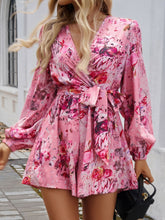 Close-up of floral pattern and waist tie on dusty pink Floravelle™ Romper.