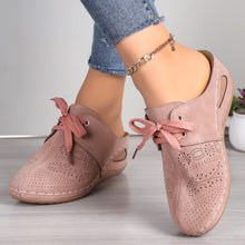 A model showcasing the side and front of a pair  of the dusty pink Lace-Up Round Toe Wedge Sandals and a gold anklet and blue jeans.