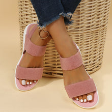 Model wearing Rubber Open Toe Low Heel Sandals in blush pink