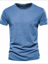 Front view of dusty blue round neck short sleeve cotton tee