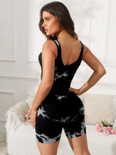 Back view of black tie-dye EliteCore Sculpt Romper showcasing u-neck cut.