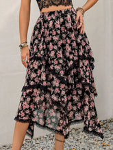 Elurevyn black floral print lace midi skirt side view showcasing layered flow and soft drape