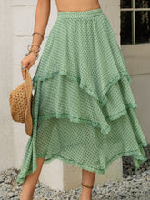 Close-up of Elurevyn gum leaf polka dot print lace midi skirt showing lace trim and lightweight layered fabric