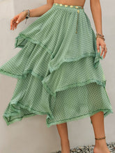 Elurevyn gum leaf polka dot print lace midi skirt side view showcasing layered flow and soft drape