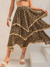 Elurevyn leopard print lace midi skirt side view showcasing layered flow and soft drape