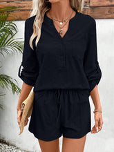 Model wearing black Everyday Escape Lounge Set poolside at a resort, styled with black cat-eye sunglasses, woven crossbody bag, and flat sandals for sunset drinks.