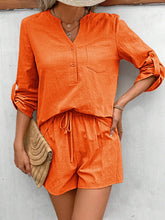 Bold orange Everyday Escape Lounge Set on model, front view.
