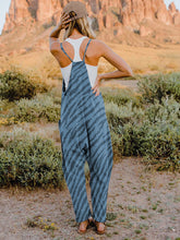Detailed view highlighting the sleeveless cut and easy-fit design of the Light Blue Exéa Jumpsuit.