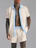 Tan Ezran ModeSet Luxe Duo men’s set — front view with open pastel blue contrast collar, textured fabric, adjustable waist, and creased shorts