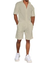 Khaki button-up short sleeve shirt and shorts set on model, front view with pocket detail.