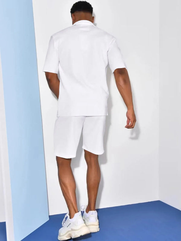Back view of solid white matching set with short sleeve shirt and elastic shorts.