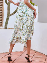 Back view of Faylora Drift Skirt in gum leaf showing cascading ruffled hem and relaxed fit