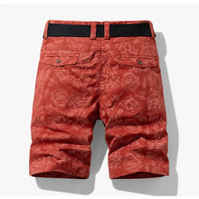 Back view of red floral Florvado Bermuda Shorts with flap pockets.