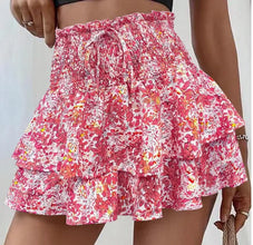 Front view of pink floral Floryza BloomLayer Ruffle Shorts.
