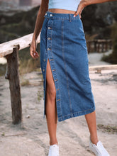 French blue Denivéra Button Skirt side pose showing button slit and washed denim texture