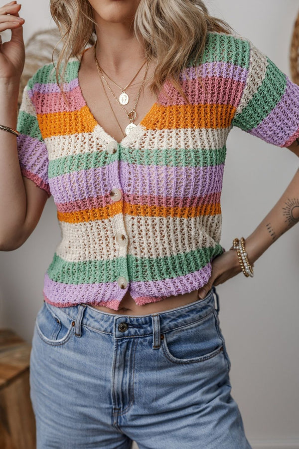 Model wearing a Striped Contrast Round Neck Short Sleeve Blouse in watermelon pink, paired with denim jeans and sandals for a fresh daytime look.